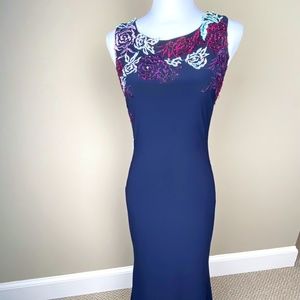Betsy & Adam Navy Blue Formal dress with see thru back.